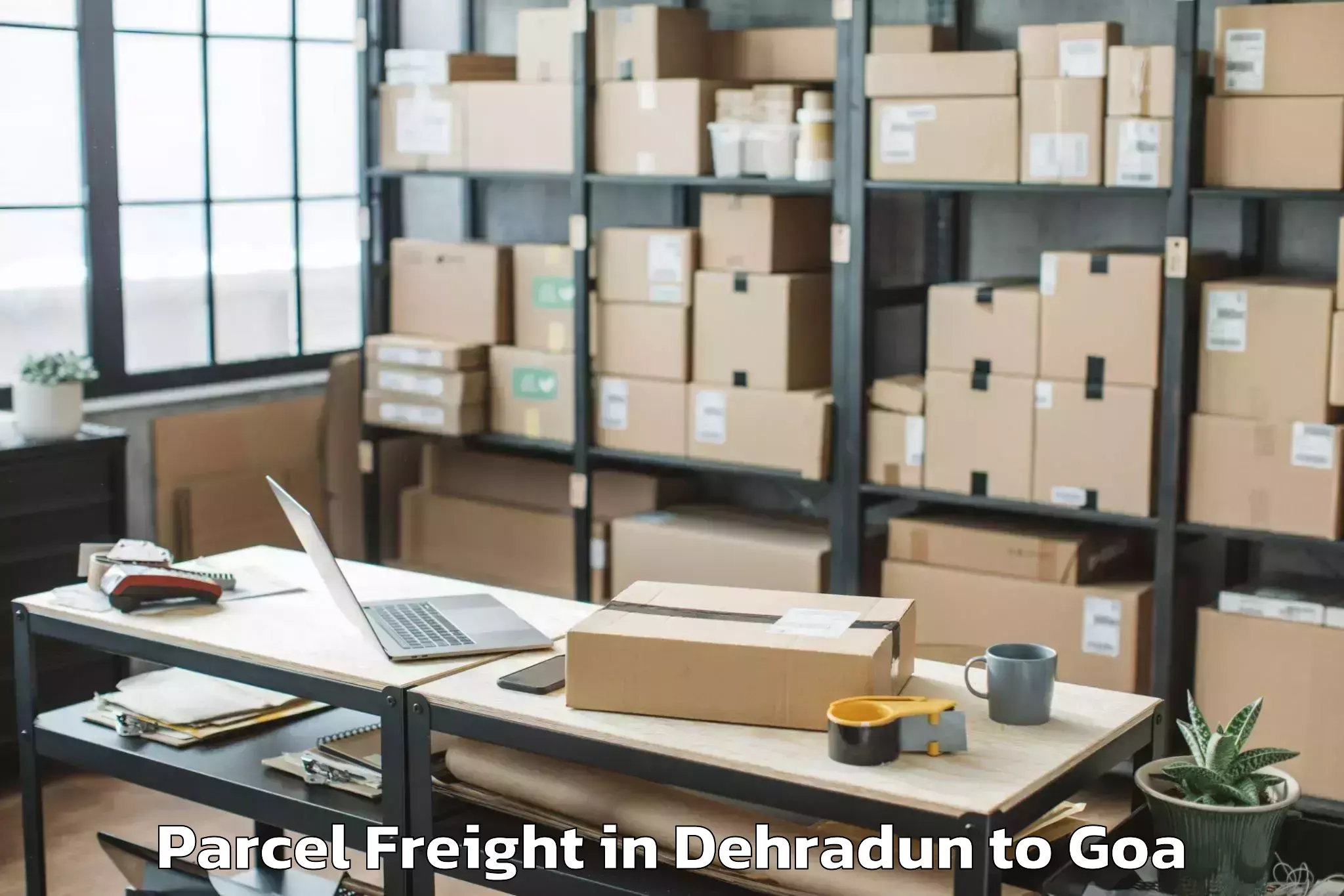 Affordable Dehradun to Mopa Parcel Freight